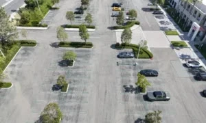 An empty parking space located away from street and public road